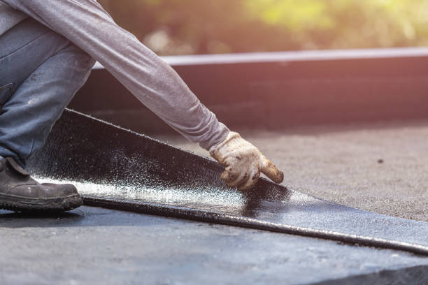 Professional Waterproofing technician working in Luther, MI